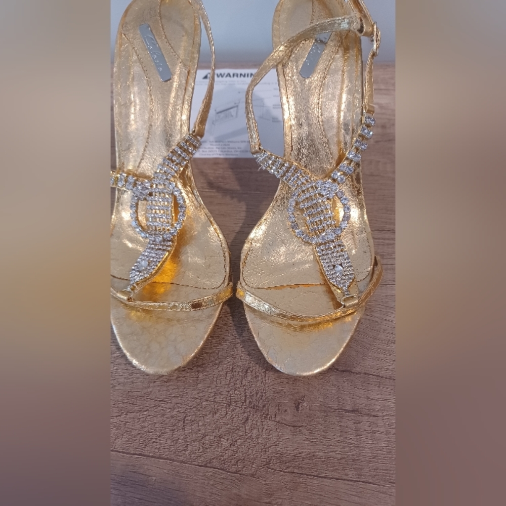 Gold tone heels with stones